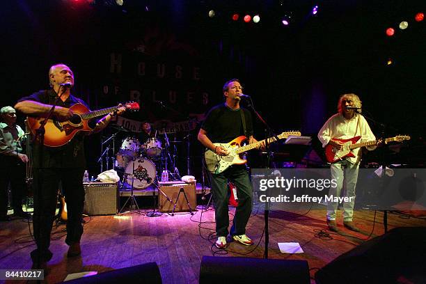 Sonny Curtis and Joe B. Mauldin of The Crickets with Eric Clapton and Albert Lee
