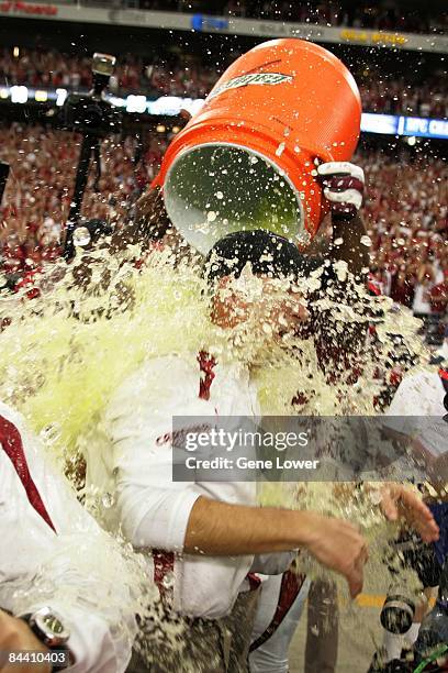 Arizona Cardinals head coach Ken Whisenhunt gets a celebratory Gatorade shower in the closing seconds of the NFC Championship game against the...