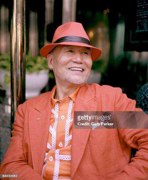 fashionable japanese senior in orange - fashionable senior stock pictures, royalty-free photos & images