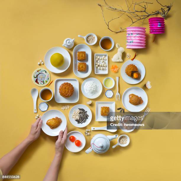 flat lay mid-autumn festival food and drink still life. - plate eating table imagens e fotografias de stock