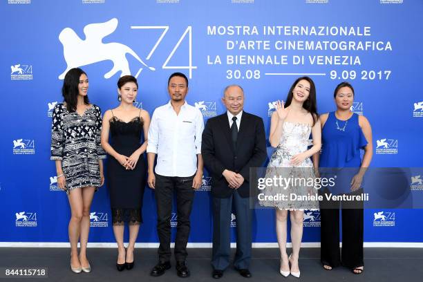 Tao Okamoto, Ha Jiwon, Zhang Hanyu, John Woo, Qi Wei and Angeles Woo attend the 'Zhuibu ' photocall during the 74th Venice Film Festival on September...