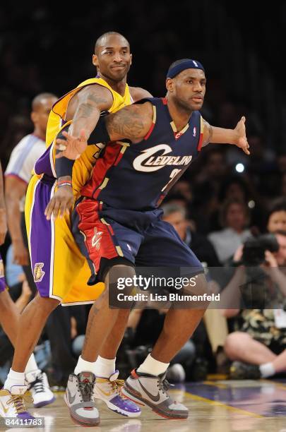 LeBron James of the Cleveland Cavaliers and Kobe Bryant of the Los Angeles Lakers battle for position during the game at Staples Center on January...