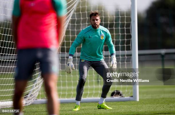 Mark Bunn of Aston Villa in action during a training session at the club's training ground at Bodymoor Heath on September 08 , 2017 in Birmingham,...