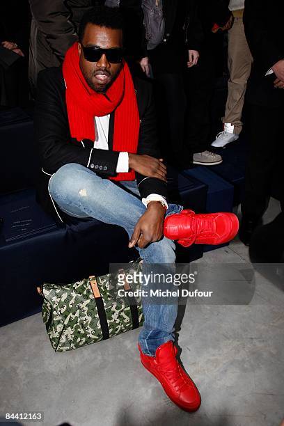 Kanye West wears red Louis Vuitton shoes that he designed at the News  Photo - Getty Images