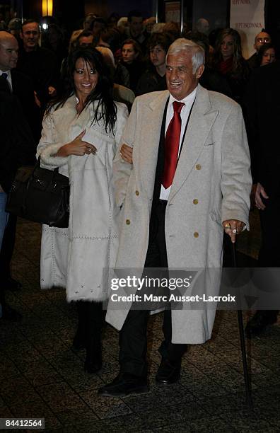 French Actor Jean-Paul Belmondo and Barbara Gandolfi leaving the premiere of "Un homme et son chien" at Gaumont Marignan January 13, 2009 in Paris,...