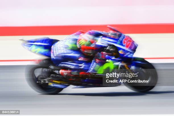 Movistar Yamaha rider Maverick Vinales from Spain takes part in the free practice session at the Marco Simoncelli Circuit ahead of the San Marino...