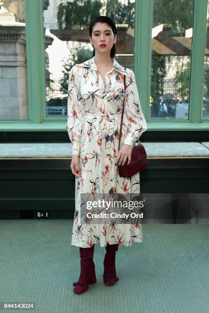 Model Ayaka Miyoshi poses backstage during the Tory Burch Spring Summer 2018 Fashion Show at Cooper Hewitt, Smithsonian Design Museum on September 8,...