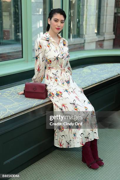 Model Ayaka Miyoshi poses backstage during the Tory Burch Spring Summer 2018 Fashion Show at Cooper Hewitt, Smithsonian Design Museum on September 8,...