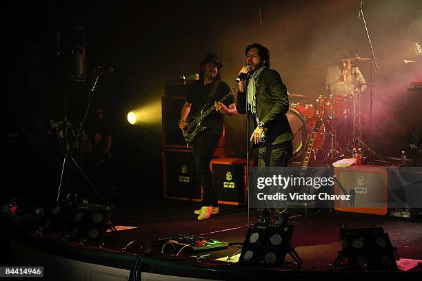 Lead singer Leonardo de Lozanne, bass player Javier "El Cha!" Ramirez and drummer Jay de la Cueva of Fobia perform during Buchanan's Forever Night...