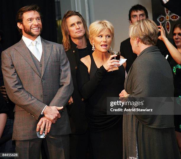Actor Hugh Jackman, photographer Russell James, Deborah-Lee Furness and Lisa Fox attend the Nomad Two Worlds Preview Exhibit at Donna Karan's Stephan...