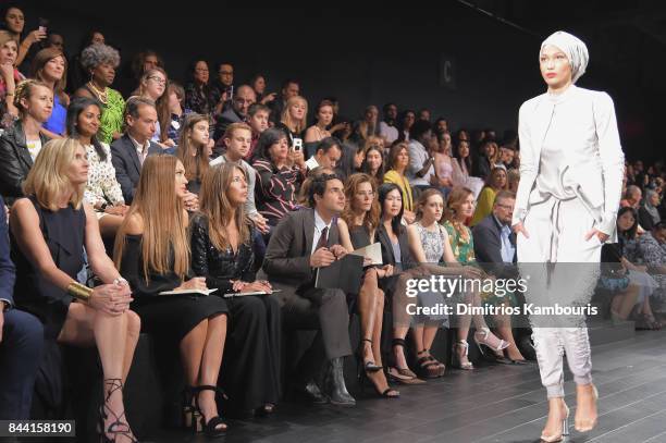 Liz Gateley, Jessica Alba, Nina Garcia, Zac Posen, Heidi Klum, Desiree Gruber, and Jane Cha attend the Project Runway fashion show during New York...