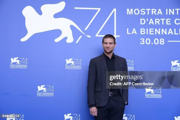 Actor Robert Finster attends the photocall of the movie "Krieg" presented in the Orizzonti selection at the 74th Venice Film Festival on September 8,...