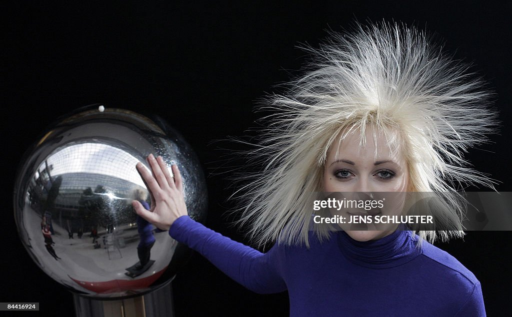Fair hostess Tanja has her hair electrif