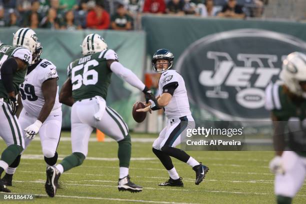 Matt McGloin of the Philadelphia Eagles passes the ball against the New York Jets during their preseason game at MetLife Stadium on August 31, 2017...