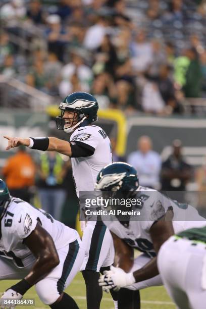 Matt McGloin of the Philadelphia Eagles calls a play against the New York Jets during their preseason game at MetLife Stadium on August 31, 2017 in...