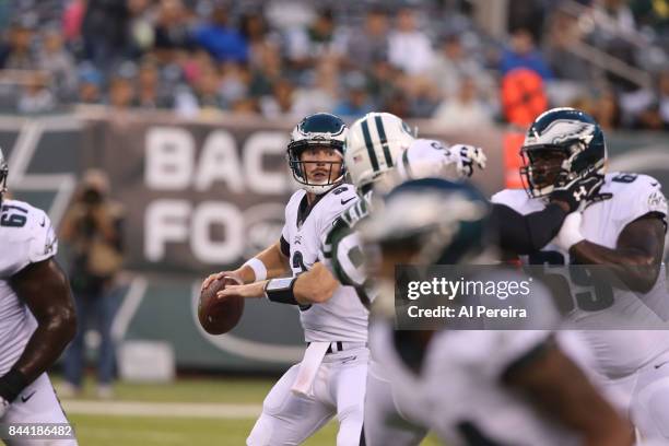 Matt McGloin of the Philadelphia Eagles passes the ball against the New York Jets during their preseason game at MetLife Stadium on August 31, 2017...