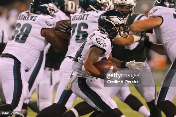 Running Back Donnel Pumphrey of the Philadelphia Eagles has a long gain against the New York Jets during their preseason game at MetLife Stadium on...