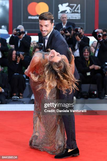 Eleonora Brunacci and Mariano Di Vaio walk the red carpet ahead of the 'Racer And The Jailbird ' screening during the 74th Venice Film Festival at...