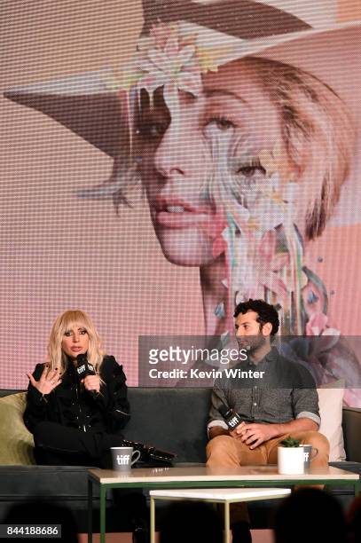 Singer Lady Gaga and director Chris Moukarbel speak onstage at "Lady Gaga: Five Foot Two" press conference during 2017 Toronto International Film...