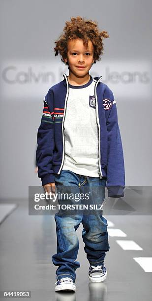 Child presents fashion from the fall/winter 2009/2010 collection of the label Calvin Klein on January 23, 2009 in Florence, during the "Pitti...