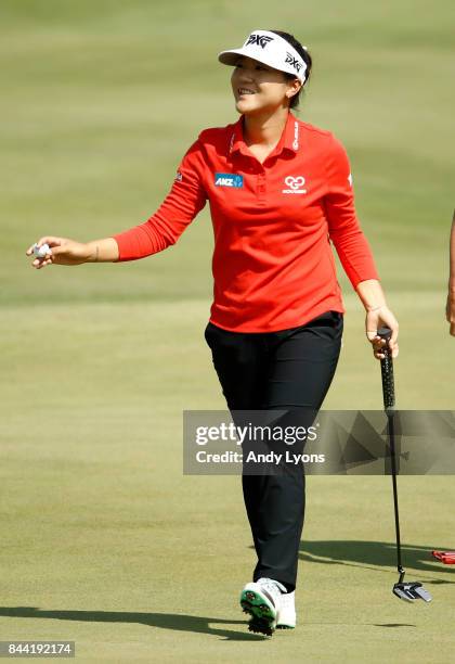 Lydia Ko of New Zealand waves to the crowd after making a birdie on the 5th hole during the second round of the Indy Women In Tech...