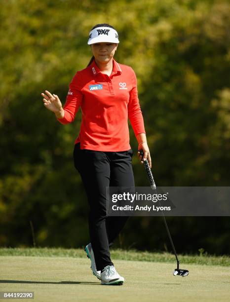 Lydia Ko of New Zealand waves to the crowd after making a birdie on the 6th hole during the second round of the Indy Women In Tech...