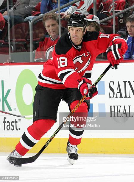 Brendan Shanahan of the New Jersey Devils plays the puck against the Montreal Canadiens at the Prudential Center on January 21, 2009 in Newark, New...