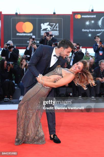 Eleonora Brunacci and Mariano Di Vaio walk the red carpet ahead of the 'Racer And The Jailbird ' screening during the 74th Venice Film Festival at...