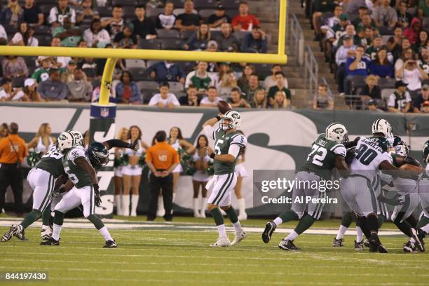 Quarterback Christian Hackenberg of the New York Jets passes the ball against the Philadelphia Eagles during their preseason game at MetLife Stadium...