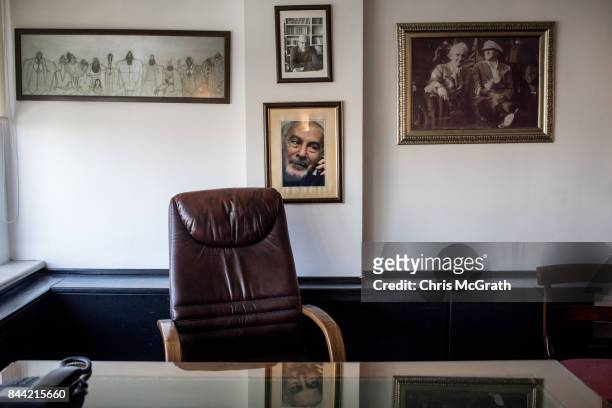 Portrait of former writer and ex-editor in chief Ilhan Selcuk is seen hanging on a wall at Cumhuriyet newspaper on September 8, 2017 in Istanbul,...