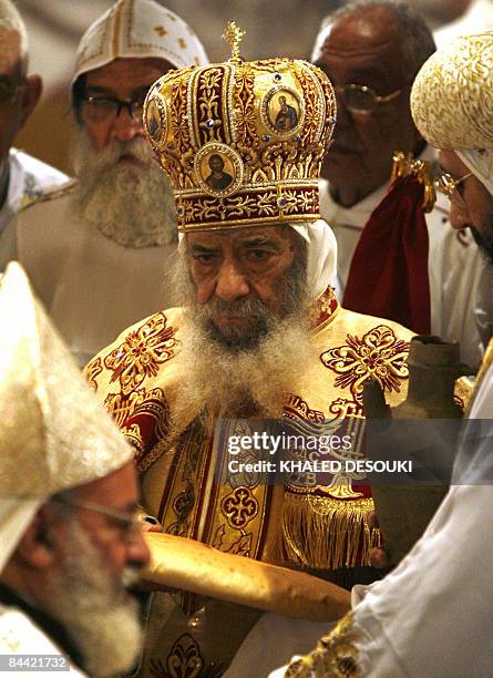 Pope Shenuda III, Head of the Egyptian Coptic Orthodox Church, leads the Coptic Christmas midnight mass in Cairo late on January 6,2009. Pope...