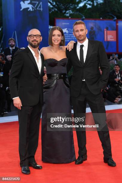 Michael Roskam, Adele Exarchopoulos and Matthias Schoenaerts walk the red carpet ahead of the 'Racer And The Jailbird ' screening during the 74th...