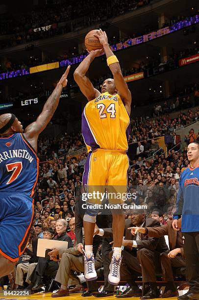 Kobe Bryant of the Los Angeles Lakers shoots a jump shot against Al Harrington of the New York Knicks during the game on December 16, 2008 at Staples...