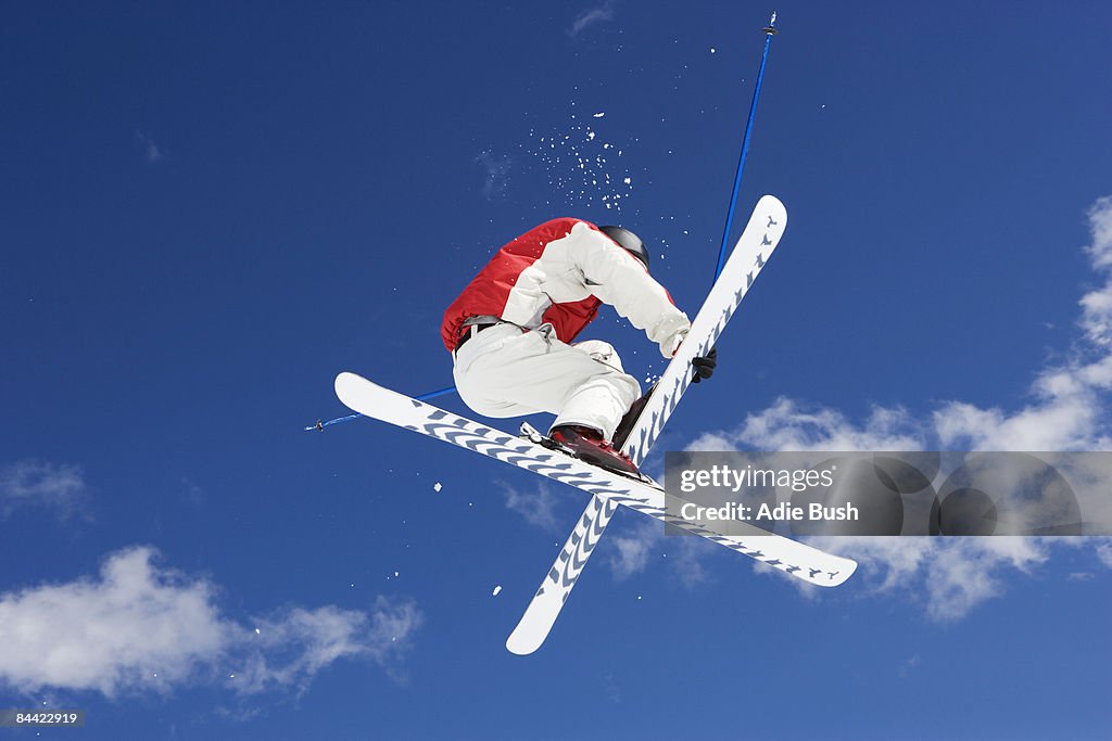 Skier performing jumping trick