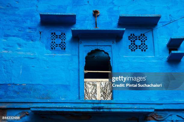 blue wall of a house in jodhpur, rajasthan, india - jodhpur stock pictures, royalty-free photos & images