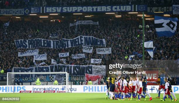 Fans of Hamburg show their protest against commercialisation prior to the Bundesliga match between Hamburger SV and RB Leipzig at Volksparkstadion on...