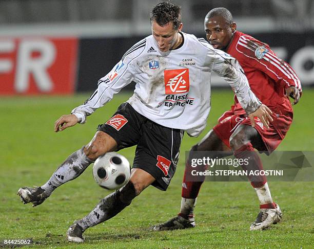 Ajaccio's French midfielder Catilina Aubameyang vies with Vannes' French midfielder David Marlot during the French cup football match Ajaccio vs....