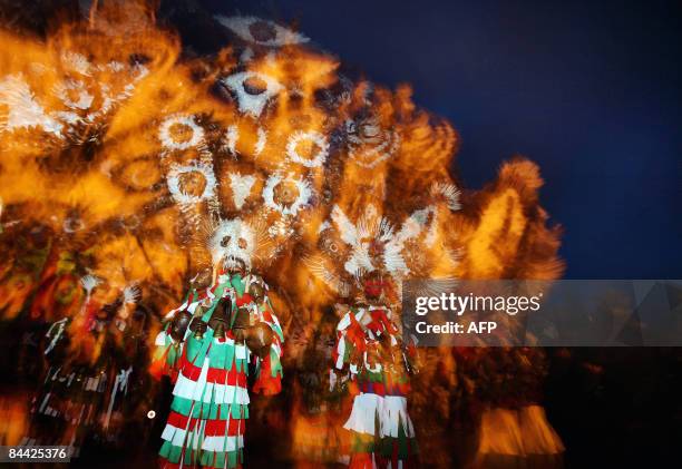 Bulgarian dancer known as a "kuker" performs a ritual dance during the International Festival of the Masquerade Games in the town of Pernik near...