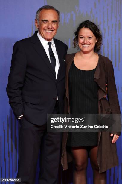 Ra Di Martino and Festival director Alberto Barbera walk the red carpet ahead of the 'Controfigura' screening during the 74th Venice Film Festival at...