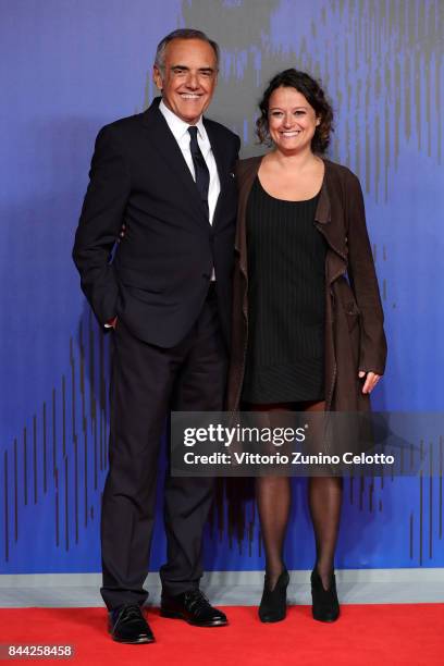 Ra Di Martino and Festival director Alberto Barbera walk the red carpet ahead of the 'Controfigura' screening during the 74th Venice Film Festival at...