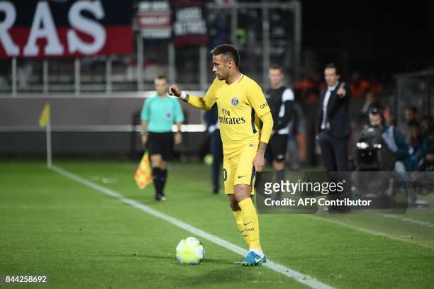 Paris Saint-Germain's Brazilian forward Neymar controls the ball during the French L1 football match between Metz and Paris Saint-Germain on...