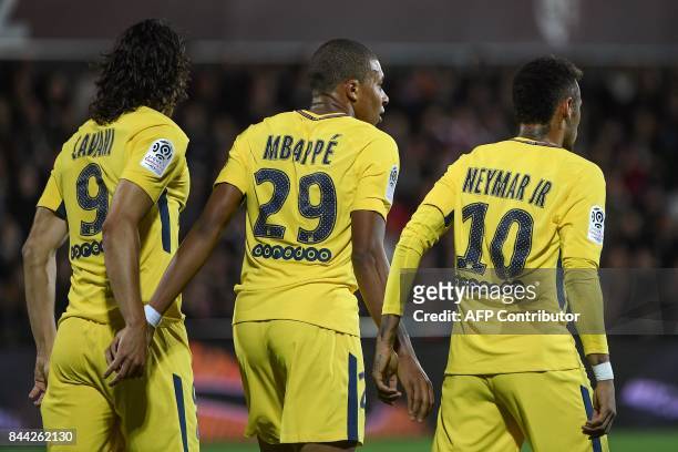 Paris Saint-Germain's Uruguayan forward Edinson Cavani, Paris Saint-Germain's French forward Kylian Mbappe and Paris Saint-Germain's Brazilian...