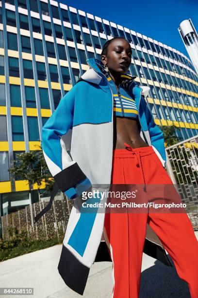 Model Nicole Atieno poses at a fashion shoot for Madame Figaro on June 19, 2017 in Paris, France. Coat , top , pants , earring . PUBLISHED IMAGE....