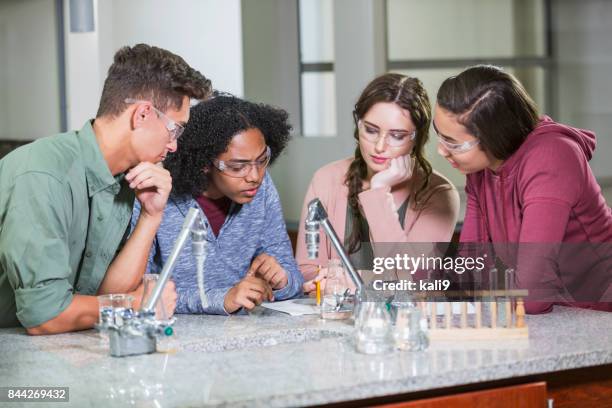 high school students in chemistry lab - chemistry class stock pictures, royalty-free photos & images