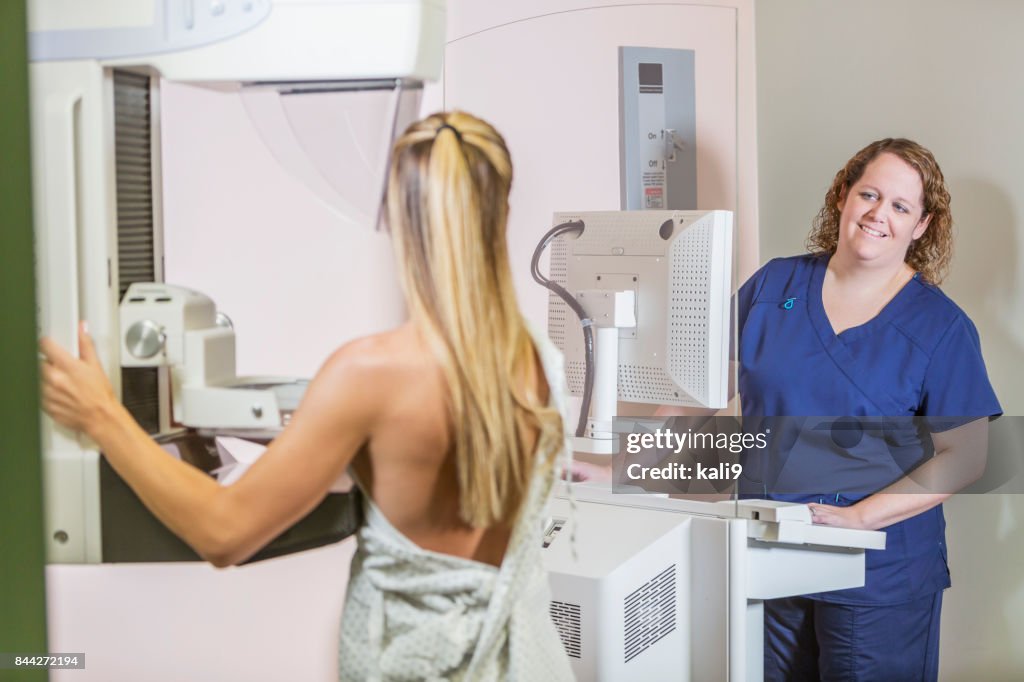 Woman getting mammogram