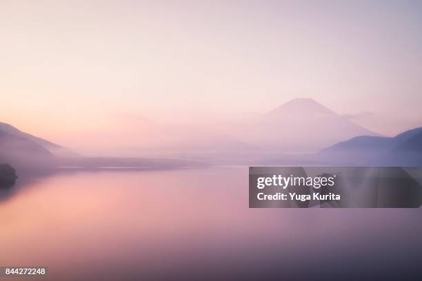 mt. fuji over a foggy lake - peace fotografías e imágenes de stock