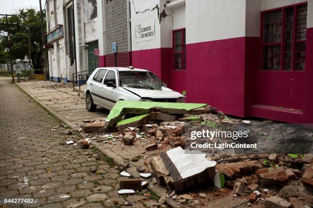 Damaged car is seen after a 8.0-magnitude earthquake hit Mexico through the southern coast of Oaxaca on September 08, 2017 in Matias Romero, Oaxaca....