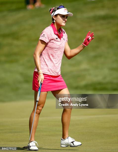 Lexi Thompson waves to the crowd after making a birdie on the 8th hole during the second round of the Indy Women In Tech Championship-Presented By...