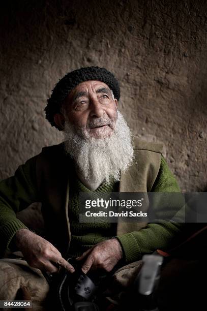 cobbler - afghan old man stock pictures, royalty-free photos & images