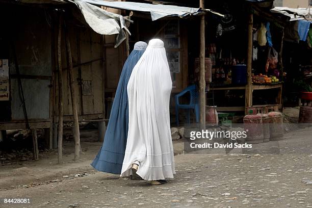 two afghan women - afghanistan stockfoto's en -beelden